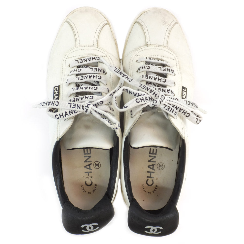 Chanel Trainers Size 37 23.5cm White Black Leather Coco Lock Cut  Shoes