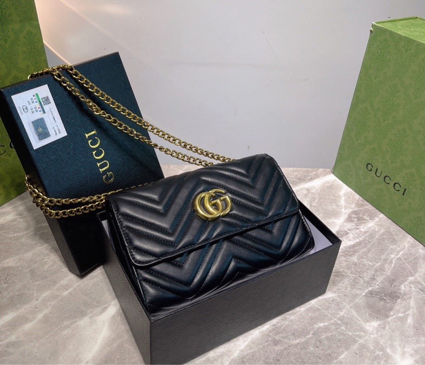 Black Gucci handbag