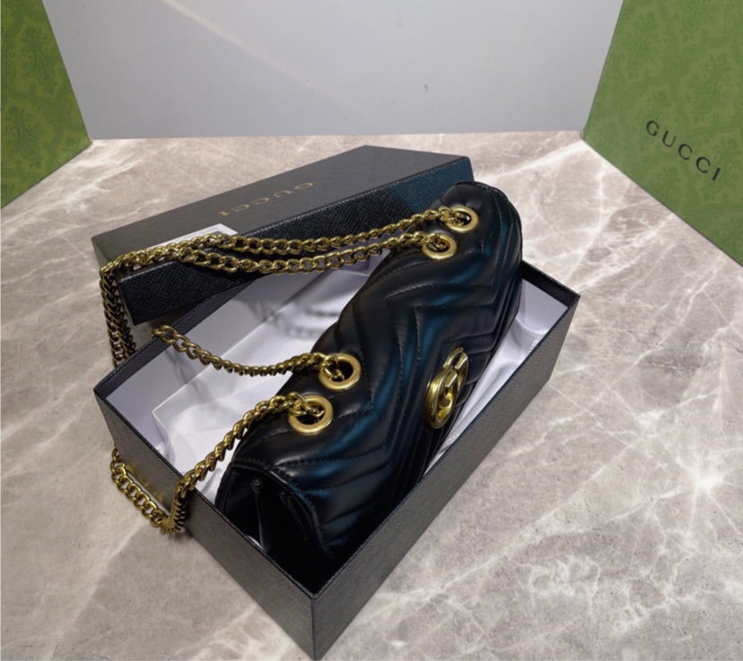 Black Gucci handbag