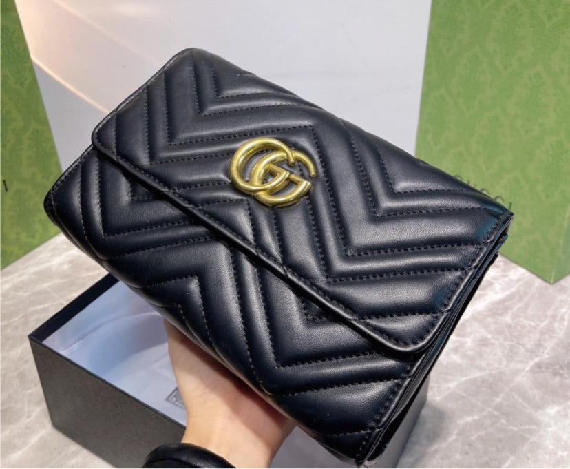 Black Gucci handbag